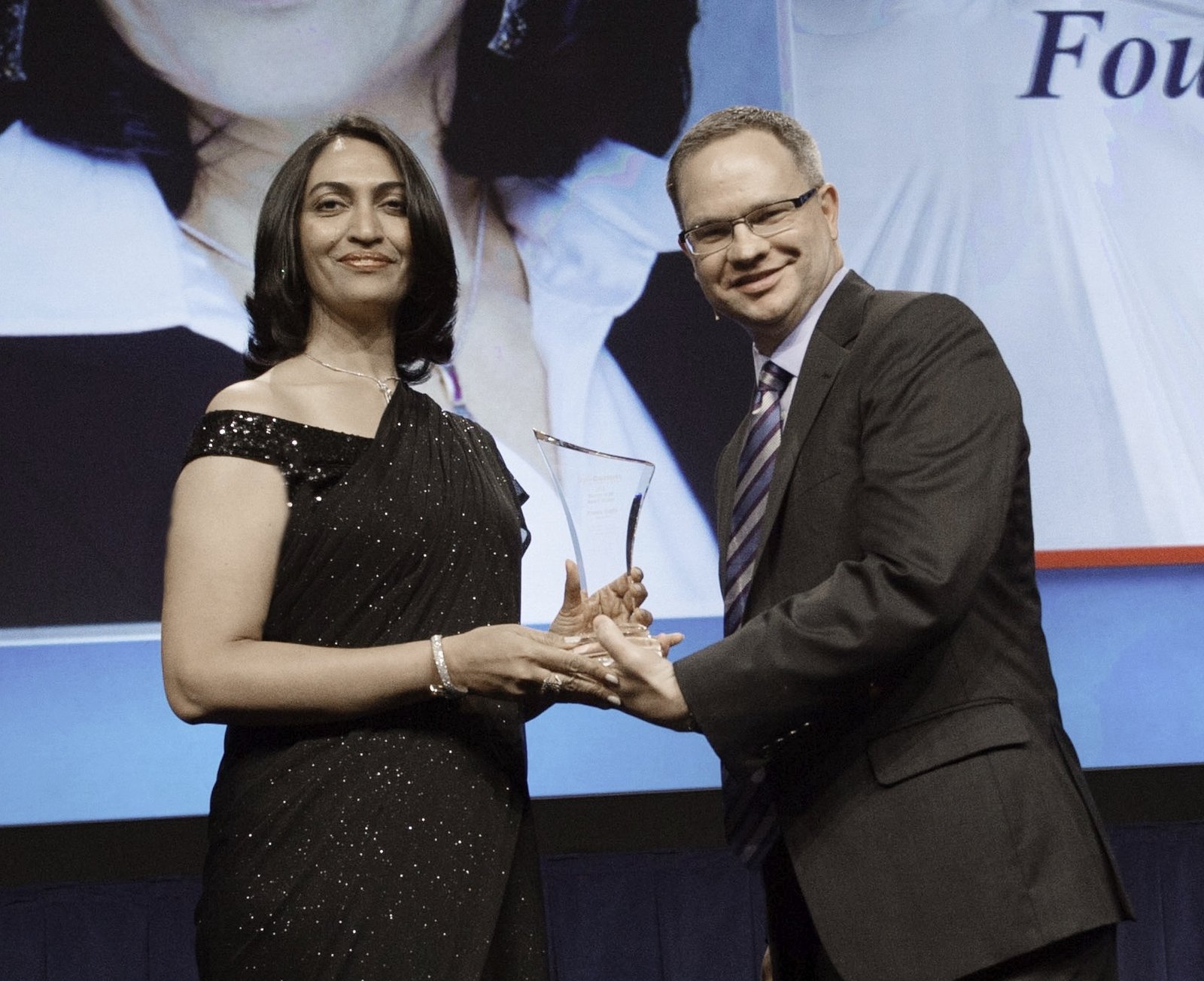 Aneeta Gupta receiving Women in AV Award at InfoComm 2013